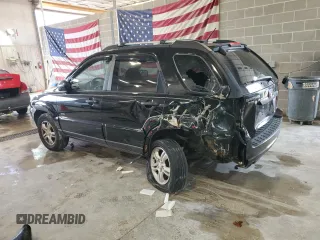 2005 Kia Sportage LX with VIN KNDJE723X57131795, listed as a Copart auction lot 79035214 with 146,746 mi miles and Salvage Title. Bid and sale history available at carsss.com. Image 2.