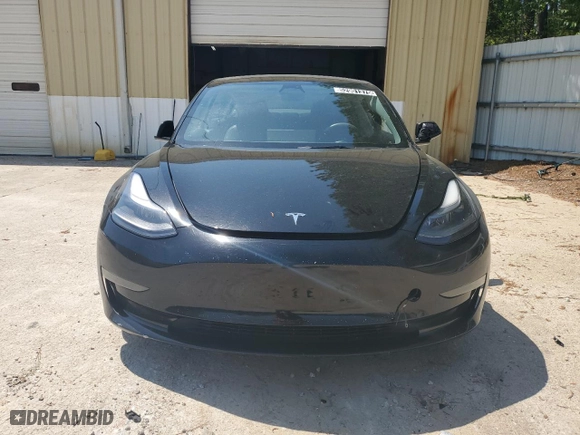 2023 Tesla Model 3 with VIN 5YJ3E1EA2PF438438, listed as a Copart auction lot 52901375 with 63,181 mi miles and Salvage Title. Bid and sale history available at carsss.com. Image 5.