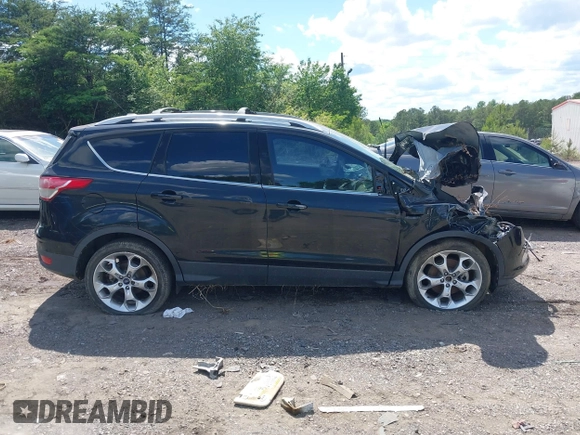 2015 Ford Escape Titanium с VIN 1FMCU0J99FUA73590, выставлен на аукционе IAAI как лот 42152021 с пробегом Не указан миль и . История ставок и продаж доступна на DreamBid. Изображение 12.