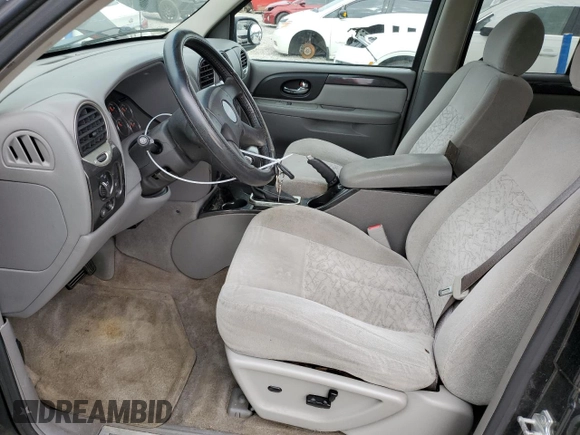 2006 GMC Envoy SLT with VIN 1GKDS13SX62354690, listed as a Copart auction lot 84138814 with 194,669 mi miles and Salvage Title. Bid and sale history available at carsss.com. Image 7.