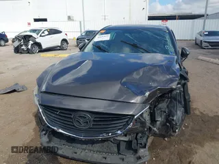 2016 Mazda Mazda6 i Sport with VIN JM1GJ1U56G1422012, listed as a IAAI auction lot 40693636 with 93,094 mi miles. Bid and sale history available at carsss.com. Image 12.
