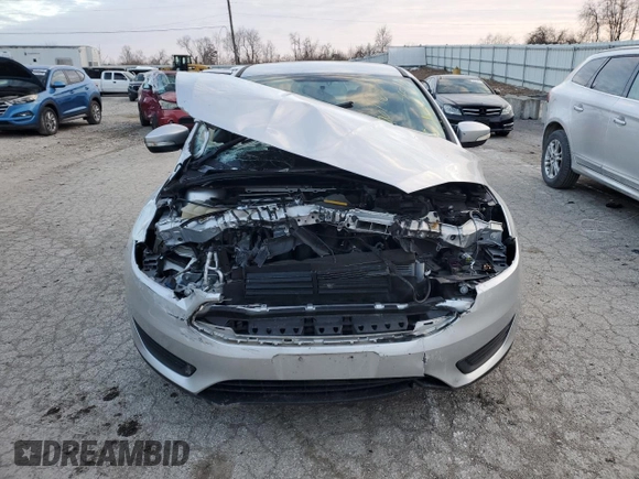 2015 Ford Focus SE with VIN 1FADP3F2XFL306322, listed as a Copart auction lot 41367765 with 58,901 mi miles and Salvage Title. Bid and sale history available at DreamBid. Image 5.