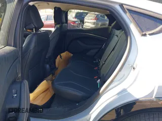 2024 Ford Mustang Mach-E Premium z VIN 3FMTK3R45RMA27232, wystawiony jako IAAI lot #42289046 z przebiegiem 10 624 mil mil oraz . Historia ofert i sprzedaży dostępna na DreamBid. Obrazek 8.