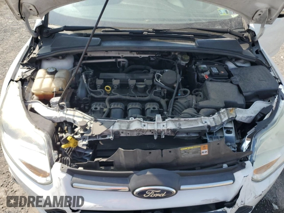 2012 Ford Focus SE with VIN 1FAHP3F21CL445400, listed as a Copart auction lot 58512535 with 142,515 mi miles and Salvage title. Bid and sale history available at DreamBid. Image 11.
