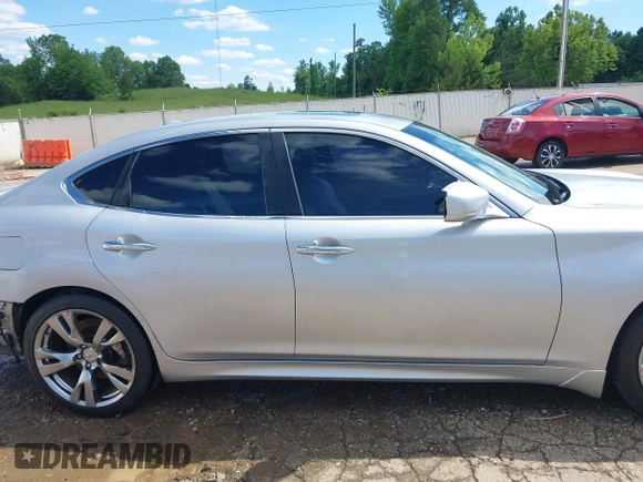 2013 Infiniti M with VIN JN1BY1AP0DM513527, listed as a IAAI auction lot 42170513 with 194,908 mi miles and . Bid and sale history available at DreamBid. Image 14.