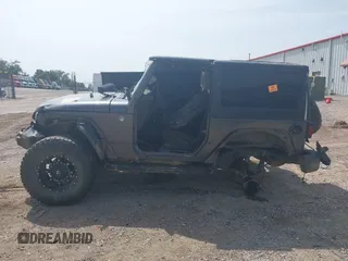 2014 Jeep Wrangler Sport with VIN 1C4AJWAGXEL233647, listed as a IAAI auction lot 39993785 with Not Provided miles and . Bid and sale history available at DreamBid. Image 15.