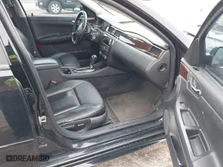 2013 Chevrolet Impala LTZ with VIN 2G1WC5E33D1129273, listed as a IAAI auction lot 42086191 with 206,340 mi miles. Bid and sale history available at carsss.com. Image 5.
