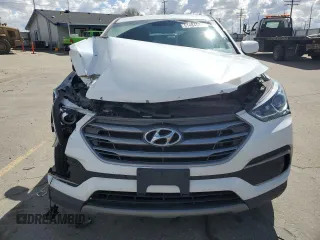 2018 Hyundai Santa Fe 2.4L z VIN 5NMZTDLB1JH076587, wystawiony jako Copart lot #51484585 z przebiegiem 106 026 mil mil oraz Szkoda całkowita • Salvage title. Historia ofert i sprzedaży dostępna na DreamBid. Obrazek 5.