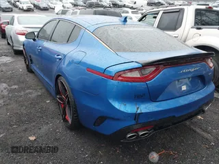 2018 Kia Stinger GT1 with VIN KNAE45LCXJ6018532, listed as a IAAI auction lot 41563629 with 91,043 mi miles. Bid and sale history available at carsss.com. Image 3.
