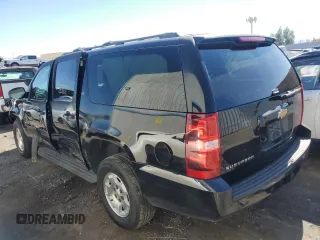 2014 Chevrolet Suburban LT with VIN 1GNSKJE71ER227075, listed as a Copart auction lot 76675654 with 214,113 mi miles and Salvage Title. Bid and sale history available at DreamBid. Image 2.
