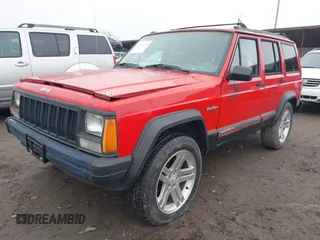 1995 Jeep Cherokee Sport with VIN 1J4FJ68S7SL582142, listed as a IAAI auction lot 41749115 with 185,676 mi miles. Bid and sale history available at carsss.com. Image 2.