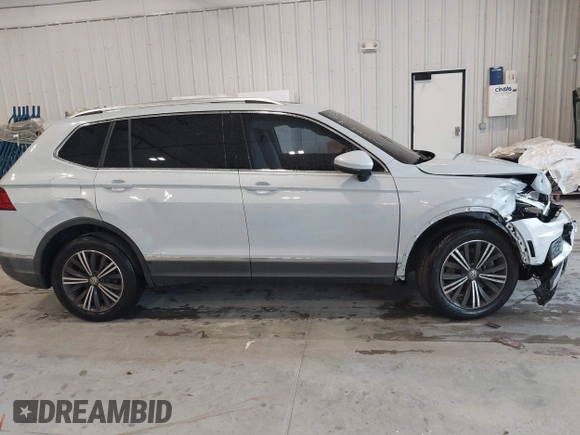 2019 Volkswagen Tiguan SE with VIN 3VV3B7AX9KM030028, listed as a IAAI auction lot 40445099 with 85,400 mi miles and . Bid and sale history available at DreamBid. Image 13.