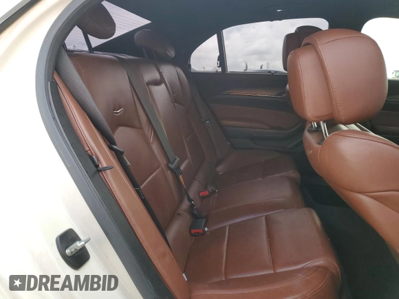 2014 Cadillac CTS Premium AWD with VIN 1G6AZ5S35E0156897, listed as a Copart auction lot 55838595 with 124,999 mi miles and Salvage title. Bid and sale history available at DreamBid. Image 10.