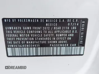 2014 Volkswagen Jetta Sedan S with VIN 3VW2K7AJ6EM334635, listed as a IAAI auction lot 42151738 with 142,923 mi miles. Bid and sale history available at carsss.com. Image 9.
