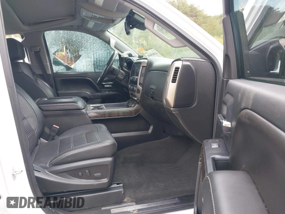 2016 GMC Sierra 2500HD Denali z VIN 1GT12UE82GF130096, wystawiony jako IAAI lot #41869448 z przebiegiem 129 659 mil mil oraz . Historia ofert i sprzedaży dostępna na DreamBid. Obrazek 5.