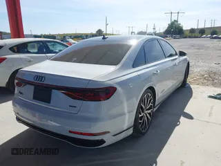 2023 Audi A8 with VIN WAULDAF88PN003324, listed as a IAAI auction lot 41023871 with 4,378 mi miles. Bid and sale history available at carsss.com. Image 4.
