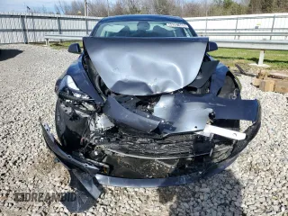 2022 Tesla Model 3 with VIN 5YJ3E1EA4NF371483, listed as a Copart auction lot 49287665 with 59,476 mi miles and Salvage Title. Bid and sale history available at DreamBid. Image 5.