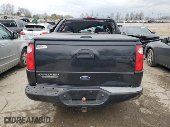 2005 Ford Explorer Sport Trac XLS with VIN 1FMZU77K75UB45740, listed as a Copart auction lot 48241124 with Not provided miles and Salvage title. Bid and sale history available at DreamBid. Image 6.