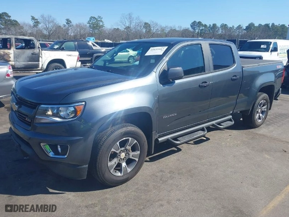2015 Chevrolet Colorado 4WD Z71 with VIN 1GCGTCE30F1171294, listed as a IAAI auction lot 41655167 with 197,888 mi miles. Bid and sale history available at carsss.com. Image 2.