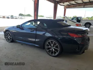 2019 BMW 8 Series M850i xDrive with VIN WBAFY4C59KBX38790, listed as a Copart auction lot 69656654 with 30,863 mi miles and Salvage Title. Bid and sale history available at carsss.com. Image 2.