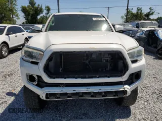 2017 Toyota Tacoma SR5 z VIN 5TFDZ5BN0HX025190, wystawiony jako Copart lot #53604695 z przebiegiem 163 039 mil mil oraz Szkoda całkowita • Salvage title. Historia ofert i sprzedaży dostępna na DreamBid. Obrazek 5.