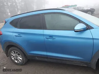 2017 Hyundai Tucson SE Plus with VIN KM8J33A42HU410216, listed as a IAAI auction lot 41337805 with 63,515 mi miles. Bid and sale history available at carsss.com. Image 13.