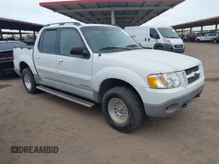 2001 Ford Explorer Sport Trac z VIN 1FMZU77E01UA66592, wystawiony jako IAAI lot #42361753 z przebiegiem 171 664 mil mil oraz . Historia ofert i sprzedaży dostępna na DreamBid. Obrazek 1.
