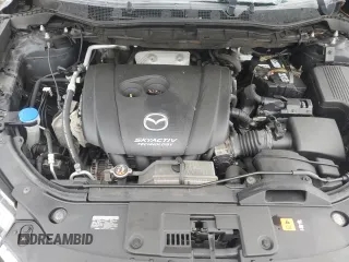 2016 Mazda CX-5 Grand Touring with VIN JM3KE4DYXG0711367, listed as a Copart auction lot 52862405 with 87,870 mi miles and Salvage Title. Bid and sale history available at DreamBid. Image 11.