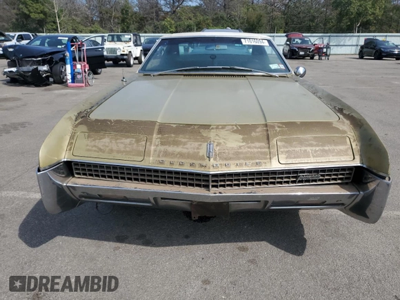 1967 Oldsmobile Toronado with VIN 396877M621130, listed as a Copart auction lot 71016094 with 17,887 mi miles and Salvage Title. Bid and sale history available at DreamBid. Image 5.