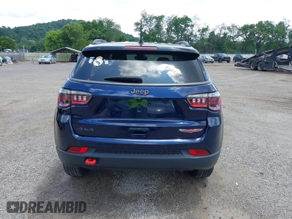 2021 Jeep Compass Trailhawk with VIN 3C4NJDDB0MT590442, listed as a IAAI auction lot 42543530 with 66,669 mi miles and . Bid and sale history available at DreamBid. Image 16.