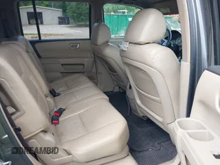 2009 Honda Pilot EX with VIN 5FNYF48489B008698, listed as a IAAI auction lot 42175230 with 268,560 mi miles and . Bid and sale history available at DreamBid. Image 8.