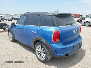2014 MINI Countryman S with VIN WMWZC3C52EWP28069, listed as a IAAI auction lot 42026583 with 137,342 mi miles and . Bid and sale history available at DreamBid. Image 3.