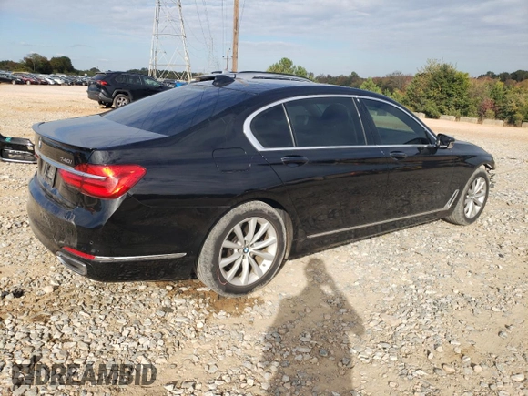 2018 BMW 7 Series 740i xDrive with VIN WBA7E4C5XJGV24003, listed as a Copart auction lot 71395443 with 63,558 mi miles. Bid and sale history available at carsss.com. Image 3.