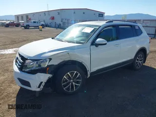 2020 Volkswagen Tiguan SE with VIN 3VV2B7AXXLM053170, listed as a IAAI auction lot 42203372 with 112,794 mi miles and . Bid and sale history available at DreamBid. Image 2.