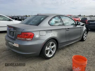 2012 BMW 1 Series 128i with VIN WBAUP9C57CVL91337, listed as a Copart auction lot 76144404 with 87,093 mi miles and Salvage title. Bid and sale history available at DreamBid. Image 3.