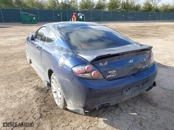 2008 Hyundai Tiburon GT with VIN KMHHN66F88U278938, listed as a IAAI auction lot 41490527 with 200,669 mi miles. Bid and sale history available at carsss.com. Image 3.