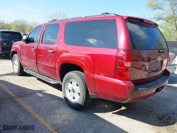 2007 Chevrolet Suburban LTZ with VIN 3GNFK163X7G259264, listed as a IAAI auction lot 42019421 with 130,744 mi miles. Bid and sale history available at carsss.com. Image 3.