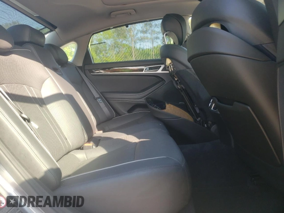 2015 Hyundai Genesis 3.8L with VIN KMHGN4JE0FU071228, listed as a Copart auction lot 52076305 with 34,557 mi miles and Salvage Title. Bid and sale history available at DreamBid. Image 10.