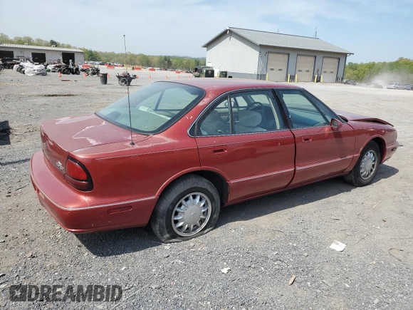 1998 Oldsmobile 88 LS z VIN 1G3HN52K2W4809677, wystawiony jako Copart lot #54331535 z przebiegiem 99 587 mil mil oraz Szkody całkowita. Historia ofert i sprzedaży dostępna na DreamBid. Obrazek 3.