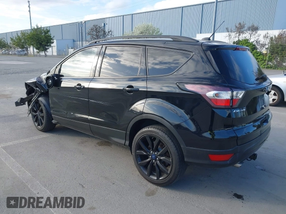2017 Ford Escape SE with VIN 1FMCU0GDXHUC95845, listed as a IAAI auction lot 41850265 with 77,691 mi miles and . Bid and sale history available at carsss.com. Image 3.