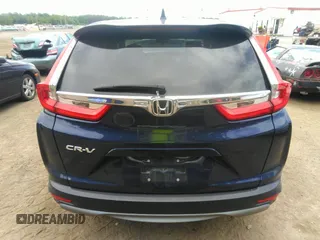 2019 Honda CR-V EX z VIN 7FARW1H51KE022321, wystawiony jako IAAI lot #42311602 z przebiegiem 58 776 mil mil oraz . Historia ofert i sprzedaży dostępna na DreamBid. Obrazek 16.