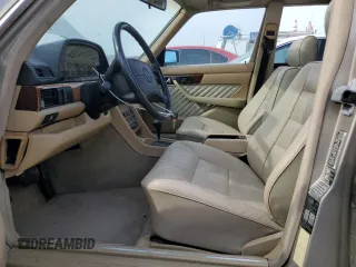 1990 Mercedes-Benz 560 z VIN WDBCA39E4LA548591, wystawiony jako Copart lot #70799134 z przebiegiem 146 323 mil mil oraz Szkoda całkowita • Salvage title. Historia ofert i sprzedaży dostępna na DreamBid. Obrazek 7.