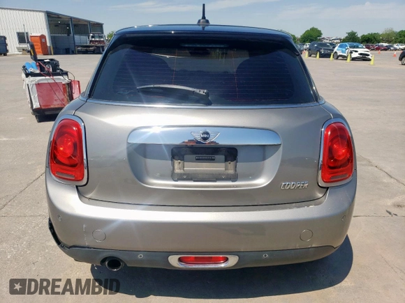 2017 MINI Hardtop 4 Door Cooper with VIN WMWXU1C53H2E18438, listed as a Copart auction lot 52871475 with 133,235 mi miles and Salvage Title. Bid and sale history available at DreamBid. Image 6.