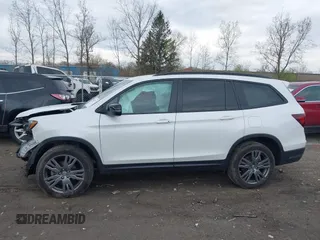 2022 Honda Pilot Sport with VIN 5FNYF6H32NB051544, listed as a IAAI auction lot 42081135 with 16,728 mi miles and . Bid and sale history available at carsss.com. Image 14.