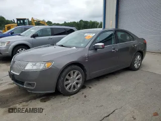 2012 Lincoln MKZ z VIN 3LNHL2JC1CR808663, wystawiony jako Copart lot #61001675 z przebiegiem 153 627 mil mil oraz Szkoda całkowita • Salvage title. Historia ofert i sprzedaży dostępna na DreamBid. Obrazek 1.