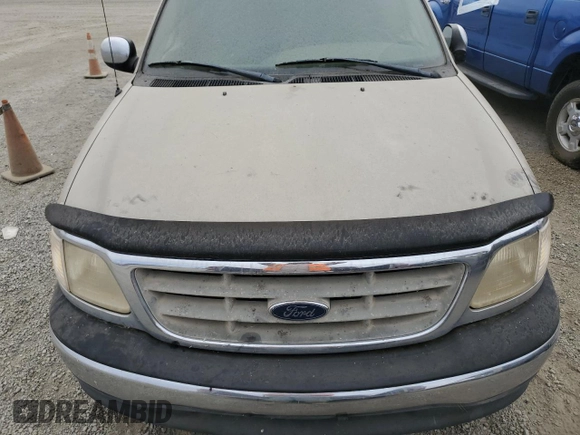 2000 Ford F-150 XL with VIN 1FTRX17L3YKB07018, listed as a Copart auction lot 66998714 with 0 mi miles and Salvage Title. Bid and sale history available at carsss.com. Image 11.