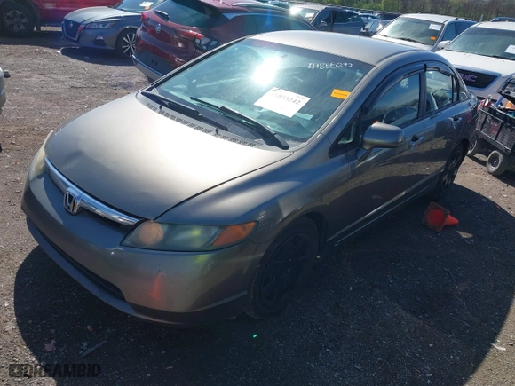 2006 Honda Civic Sdn LX with VIN 1HGFA16516L060197, listed as a IAAI auction lot 41855242 with 204,499 mi miles. Bid and sale history available at carsss.com. Image 2.