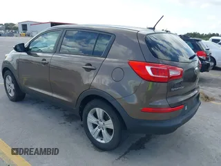 2013 Kia Sportage LX with VIN KNDPB3A28D7375304, listed as a IAAI auction lot 42566081 with 17,890 mi miles and . Bid and sale history available at DreamBid. Image 3.