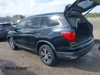 2016 Honda Pilot EX-L with VIN 5FNYF6H5XGB031594, listed as a IAAI auction lot 40409867 with 132,227 mi miles. Bid and sale history available at carsss.com. Image 3.