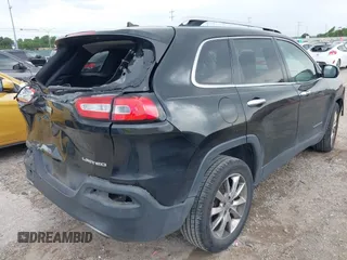 2014 Jeep Cherokee Limited with VIN 1C4PJLDS8EW104085, listed as a IAAI auction lot 42104059 with 141,951 mi miles and . Bid and sale history available at DreamBid. Image 4.